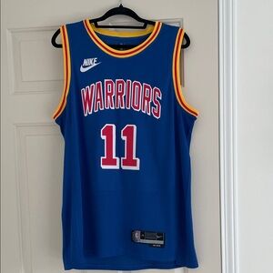 Nike Blue Warriors Jersey with Red and Yellow Trim-Klay Thompson (NBA store)